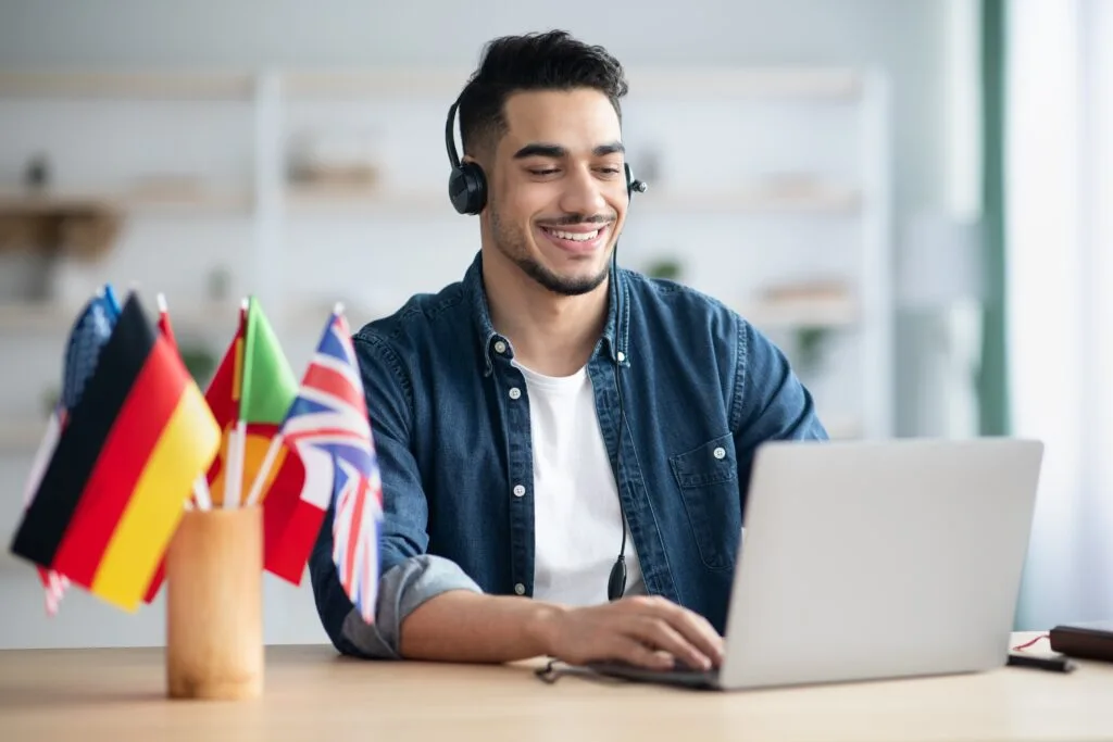 happy-arab-guy-student-learning-foreign-language-o-2023-11-27-05-21-20-utc-min arabic to english photo translator , photo translate arabic to english translate arabic to english from photo