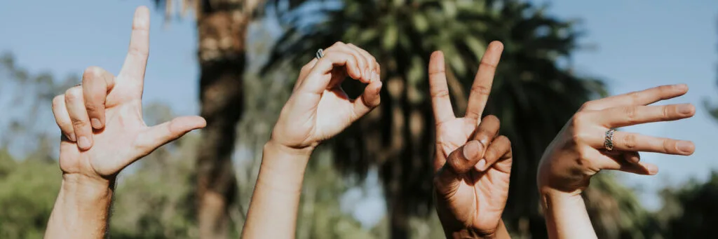 Hands forming the word love sign language translator translate to asl language sign translator sign language interpreter